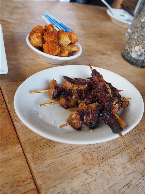 Fino anchovie stuffed fried olives and pork pinchitos