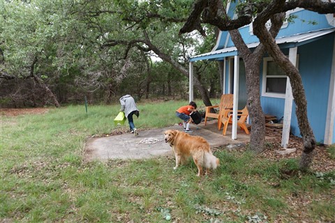 boys chasing easter eggs Wimberley