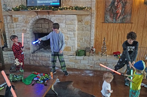 christmas morning light saber battle