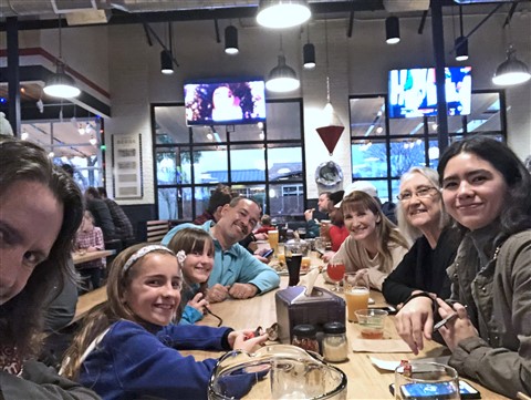 family table at Pinthouse Pizza Austin