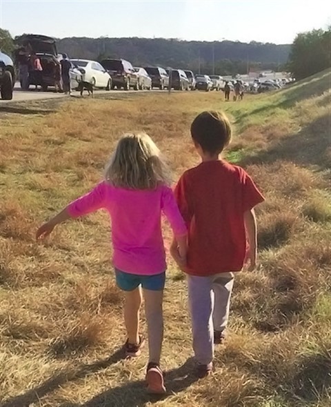 holding hands at the green belt