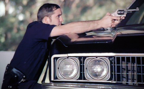 look out, I'm a cop with a gun!!