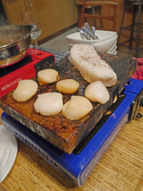 himalayan salt plate scallops and sea bass