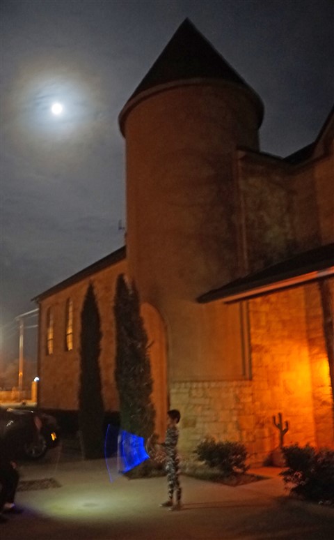 light saber at night under the full moon