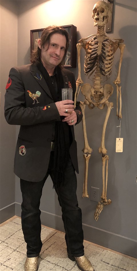 party skeleton and creepy guy