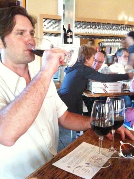 me enjoying a flight of malbec at the grove