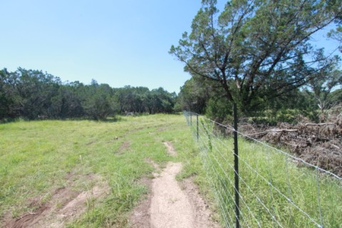 fenced in on one side