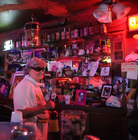 ginny at the bar at her little longhorn saloon chicken shit bingo austin