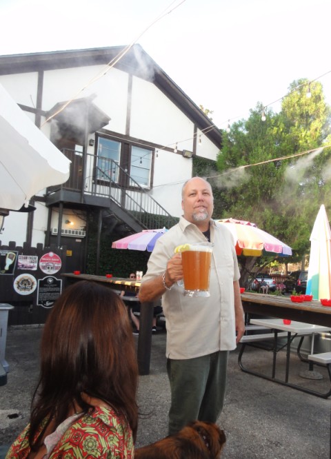 troy returns with another pitcher of live oak hefeweizen at draught house troy returns with another pitcher of live oak hefeweizen at draught house