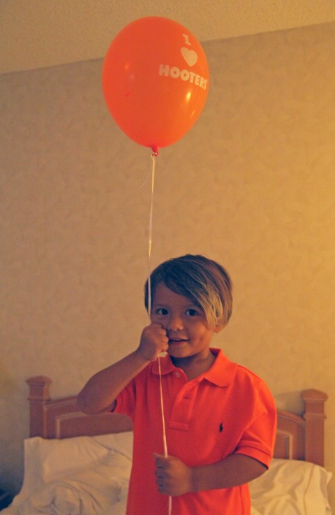 child with hooters balloon dallas westin