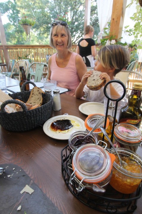 boy enjoying bread basket at blue dahlia bistro westlake