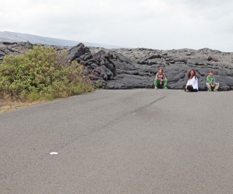 hawaii lava flow over road