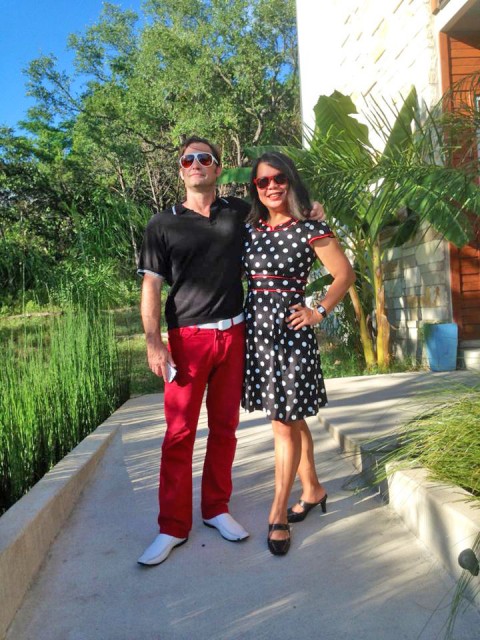 black dress with white polka dots and red trim