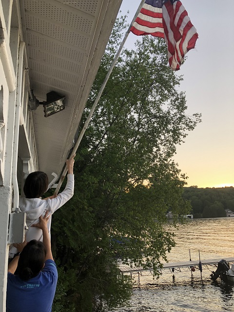 joe's pond lake house flag hoist 4th of july west danville vt