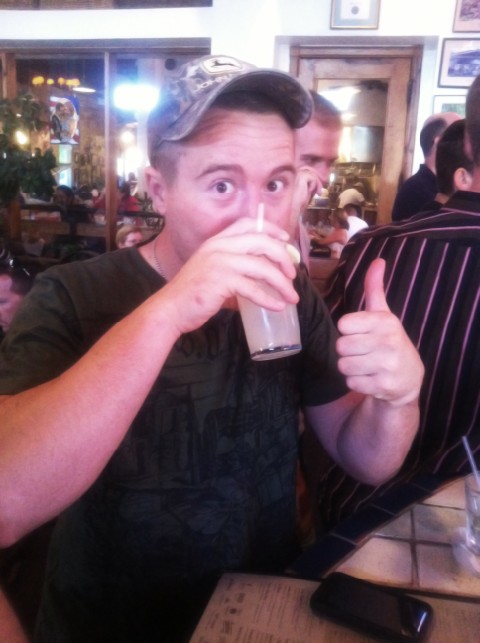 soldier at guero's austin enjoys margarita