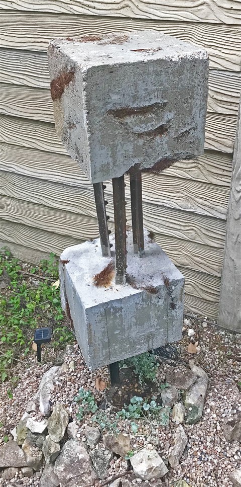 concrete and rusty metal scultpure paul schuster sculptor austin