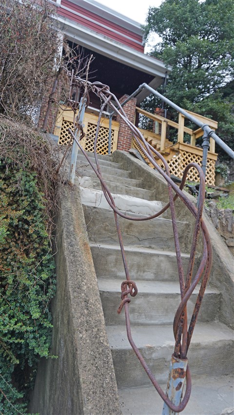 falls road twisted metal handrail baltimore 