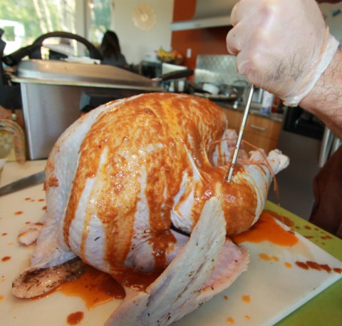 injecting the turkey with cajun and thai spices injecting the turkey with cajun and thai spices