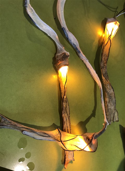 natural sausage casing art light fixture 