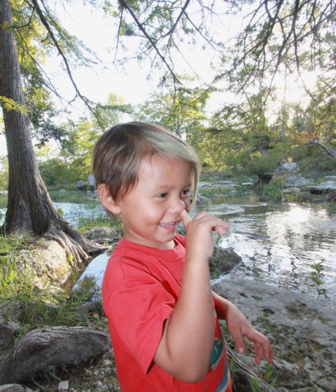 boy with finger in nose boy with finger in nose