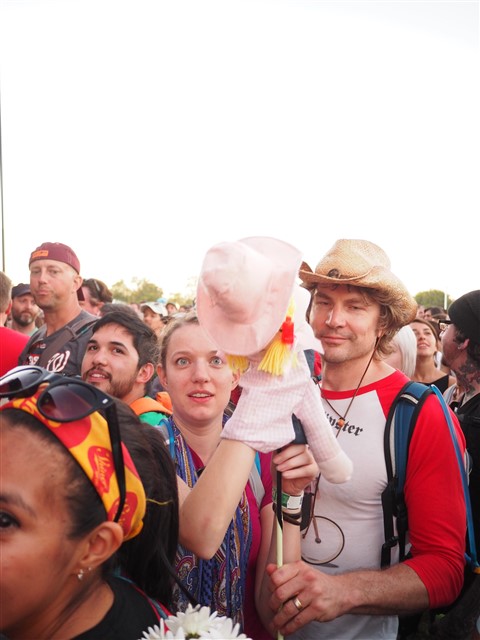 hipster with a hand puppet at acl belle and sebastian