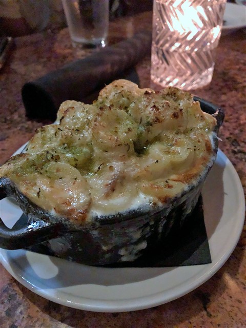 peche happy hour mac and cheese with duck confit austin 