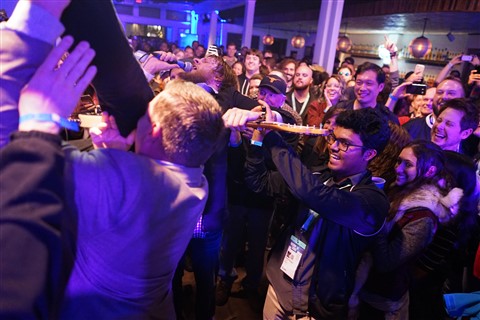 quiet company taylor muse crowd surfing with guitar